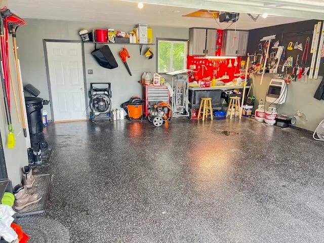 a view of a play room with furniture and toys