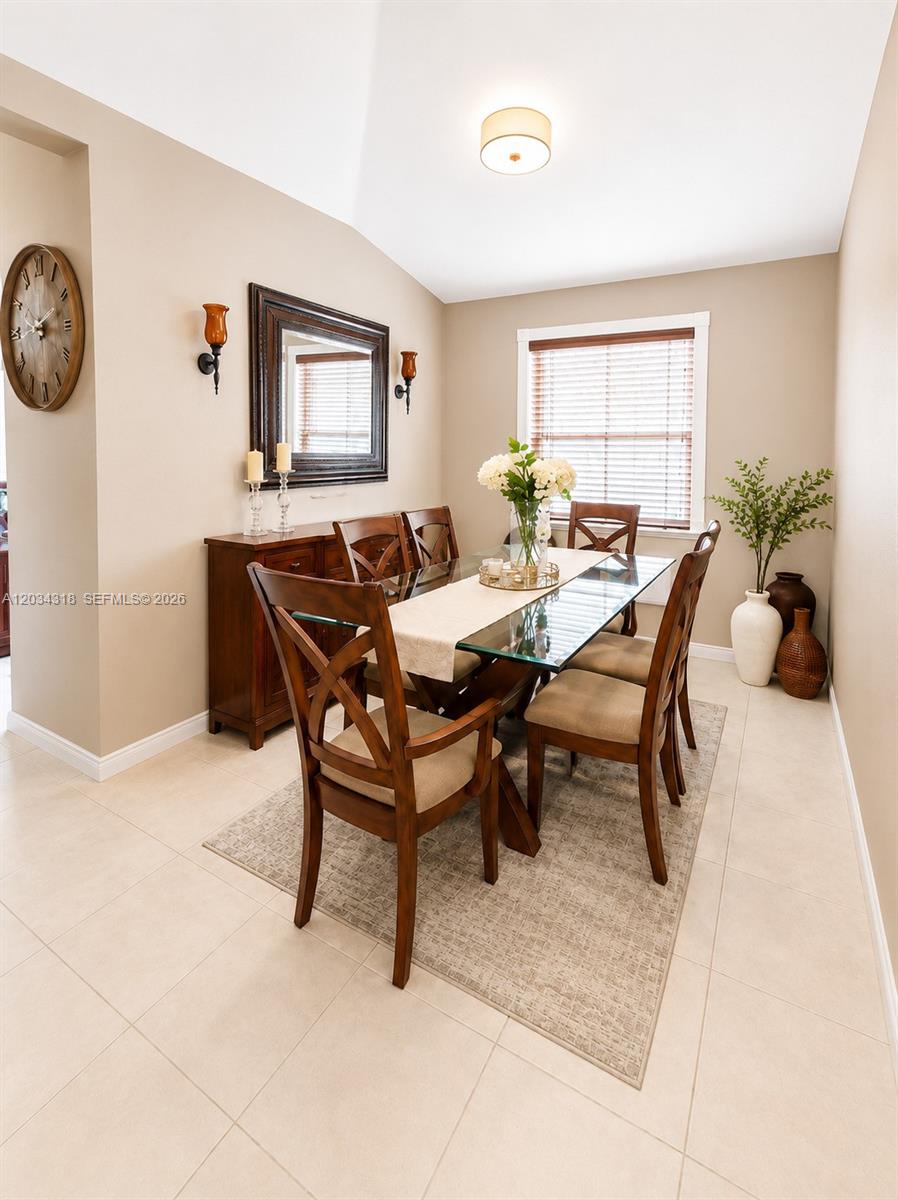 14856 Southwest 179th Street Miami, FL 33187 - Photo 15 of 33 a view of a livingroom with furniture and a table