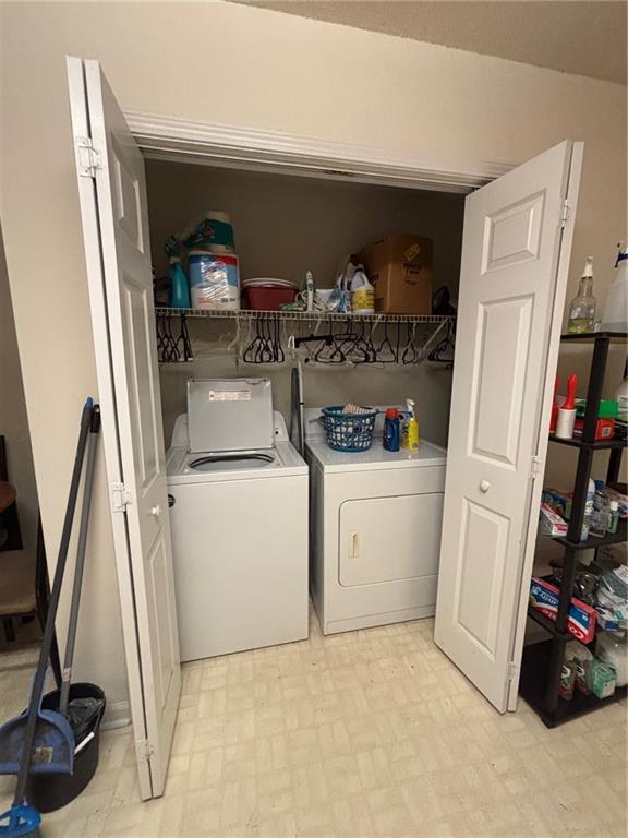2361 River Ridge Road Northeast Milledgeville, GA 31061 - Photo 9 of 12 a utility room with closet dryer and washer