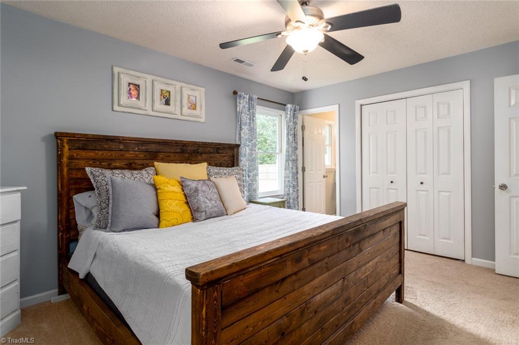 2453 Willard Road High Point, NC 27265 - Photo 15 of 29 Master bedroom has ensuite bathroom.