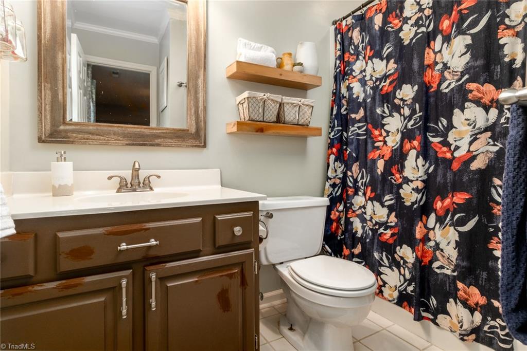2453 Willard Road High Point, NC 27265 - Photo 18 of 29 Master bath has full tub and shower.