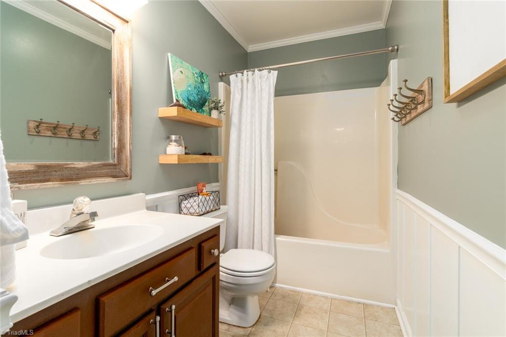 2453 Willard Road High Point, NC 27265 - Photo 21 of 29 Additional hall bathroom with full bath and shower.