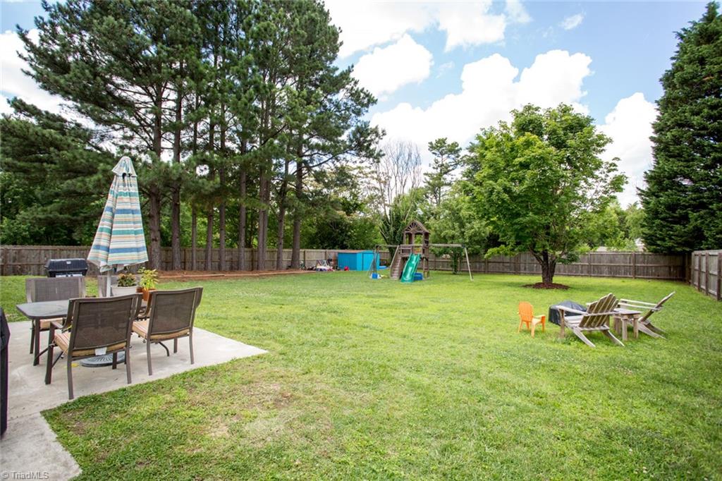 2453 Willard Road High Point, NC 27265 - Photo 26 of 29 Spacious fenced-in level backyard.