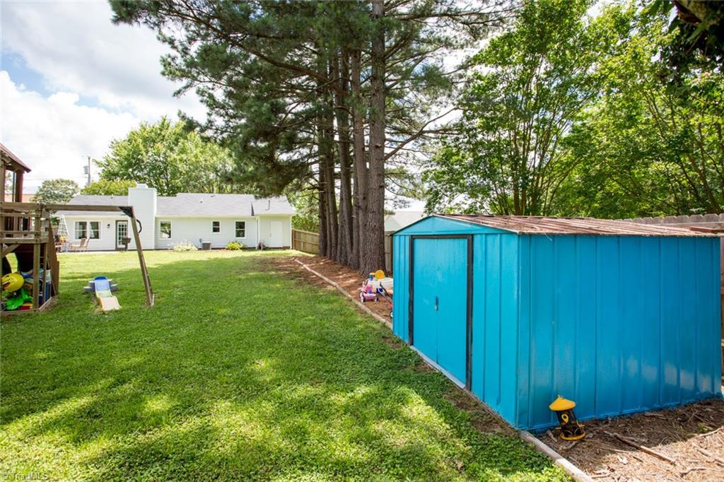 2453 Willard Road High Point, NC 27265 - Photo 28 of 29 Storage building provides additional storage area.