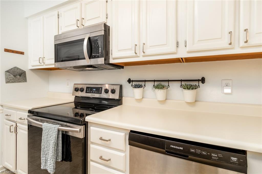 2453 Willard Road High Point, NC 27265 - Photo 9 of 29 Kitchen has stainless steel appliances and plenty of cabinet space.