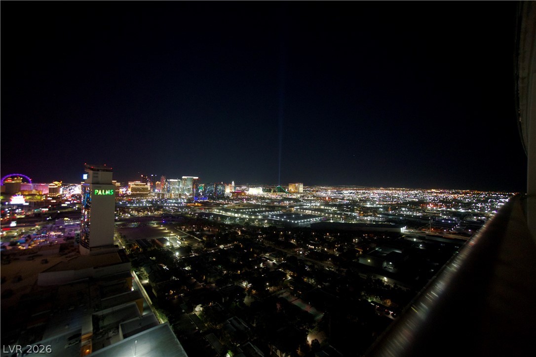 4381 West Flamingo Road, Unit 3616 Las Vegas, NV 89103 - Photo 5 of 29 City lights stretch endlessly into the night from this elevated vantage point.