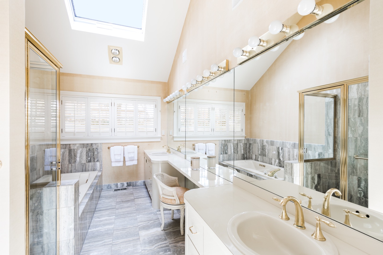 16 Amy's Lane East Hampton, NY 11937 - Photo 12 of 17 a large white kitchen with a large window and sink