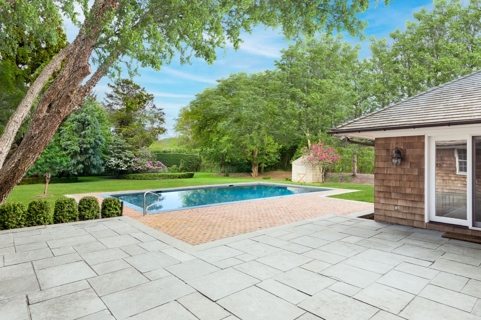 16 Amy's Lane East Hampton, NY 11937 - Photo 16 of 17 a view of a house with a yard and a large tree