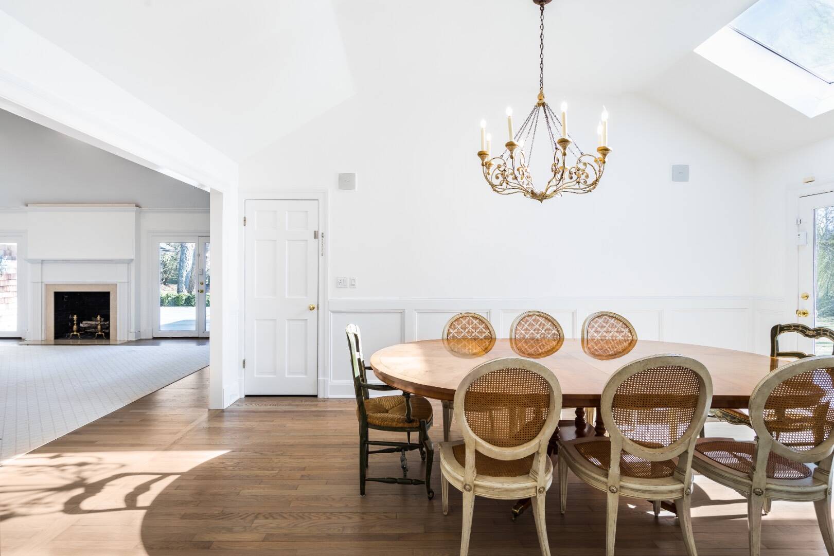 16 Amy's Lane East Hampton, NY 11937 - Photo 4 of 17 a view of a dining room with furniture and wooden floor