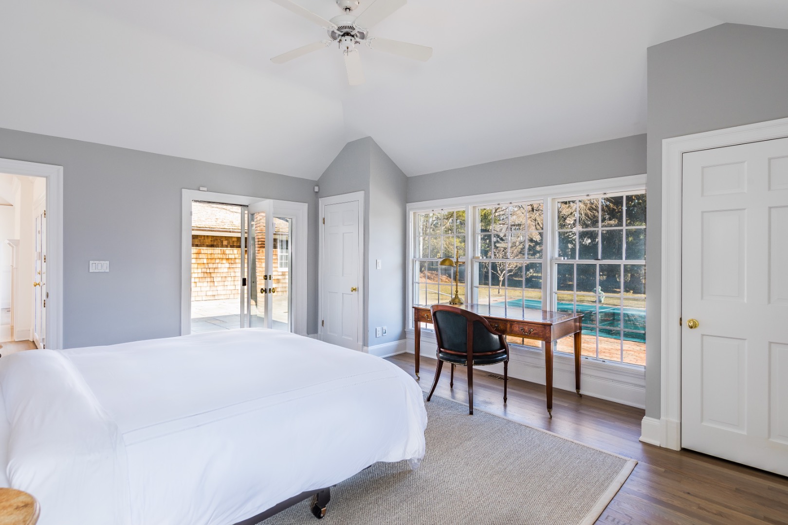 16 Amy's Lane East Hampton, NY 11937 - Photo 8 of 17 a bedroom with a bed and a table