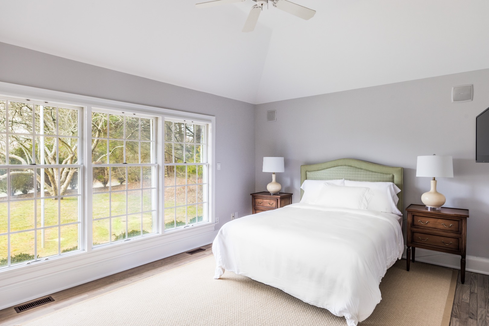 16 Amy's Lane East Hampton, NY 11937 - Photo 10 of 17 a bedroom with a large bed and a large window