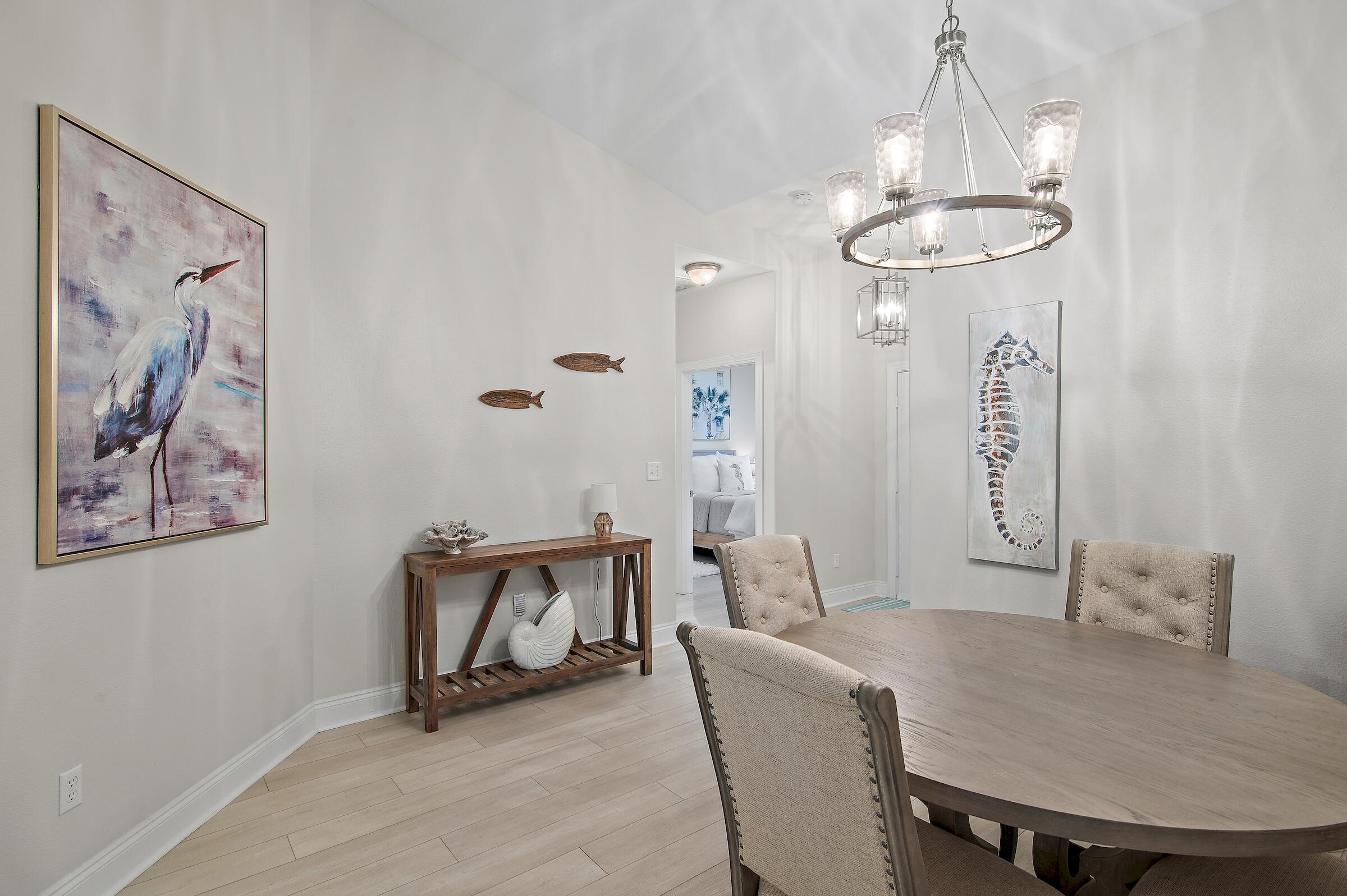 4202 Jade Loop Destin, FL 32541 - Photo 10 of 29 a view of a dining room with furniture