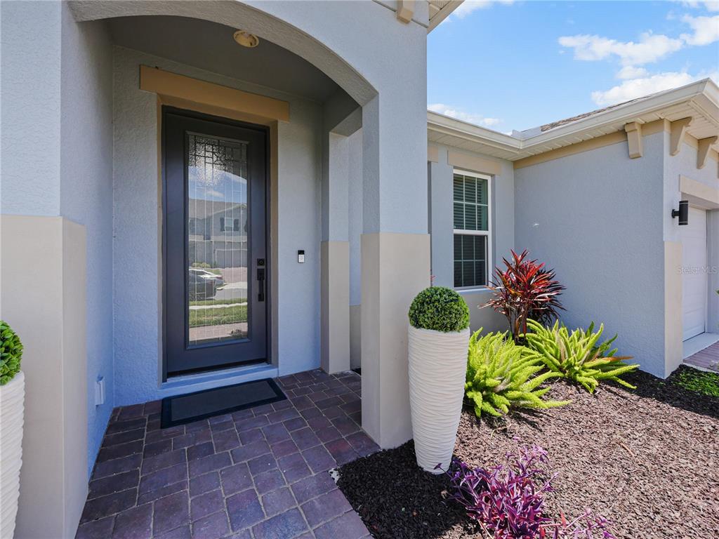 5264 Obsidian Gate Road Mount Dora, FL 32757 - Photo 3 of 49 a view of a entryway of the house