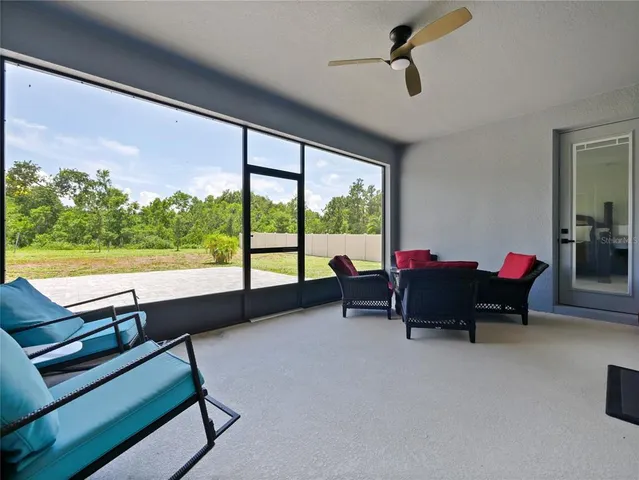 a front view of house with yard and trees