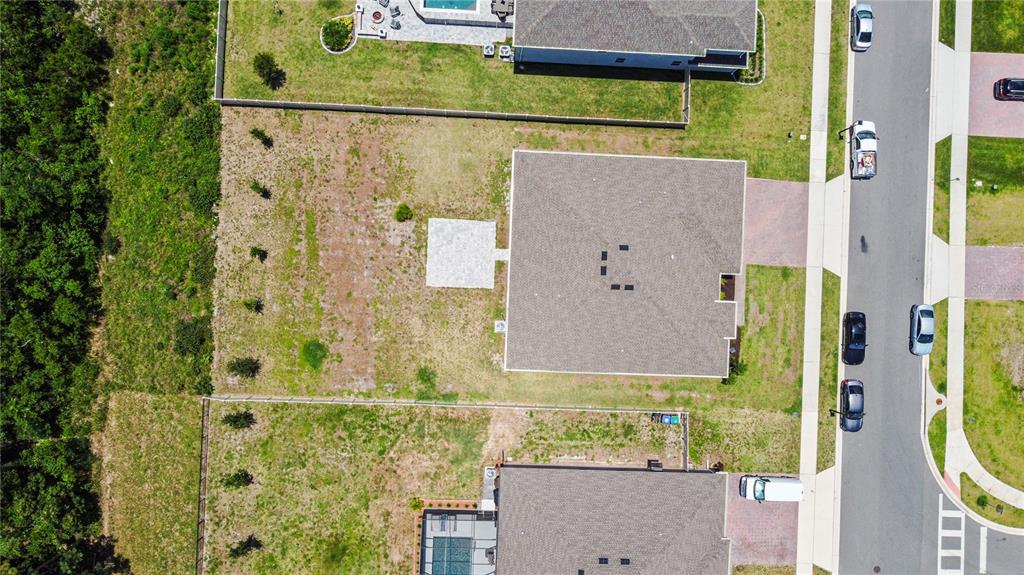 5264 Obsidian Gate Road Mount Dora, FL 32757 - Photo 41 of 49 aerial view of a bathroom with a sink and shower