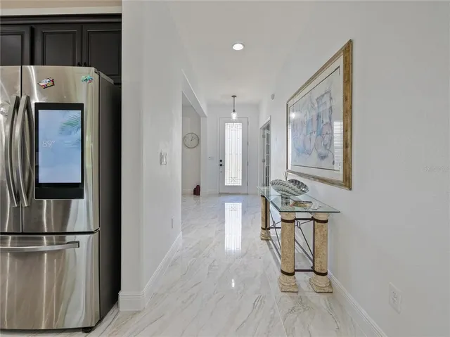 a view of kitchen with furniture and wooden floor