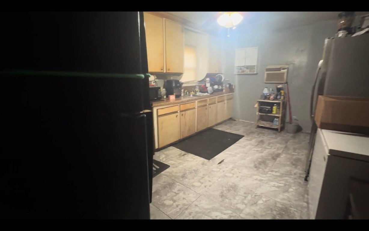 2503 Milwaukee Street Houston, TX 77026 - Photo 6 of 11 a kitchen with a sink cabinets and stainless steel appliances