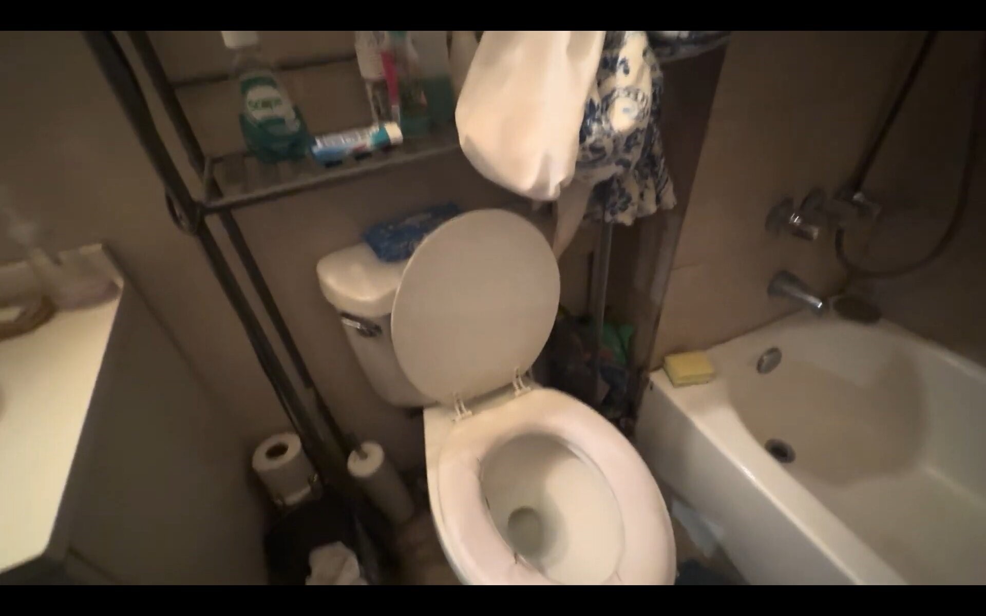 2503 Milwaukee Street Houston, TX 77026 - Photo 9 of 11 a bathroom with a toilet and a sink