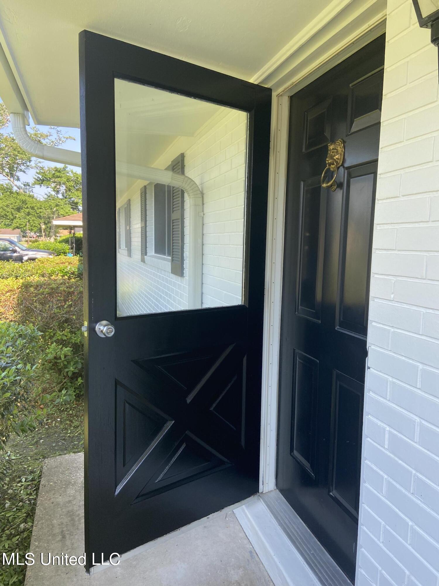 2519 Orleans Road Biloxi, MS 39531 - Photo 3 of 20 SOLID WOOD EXTERIOR DOOR