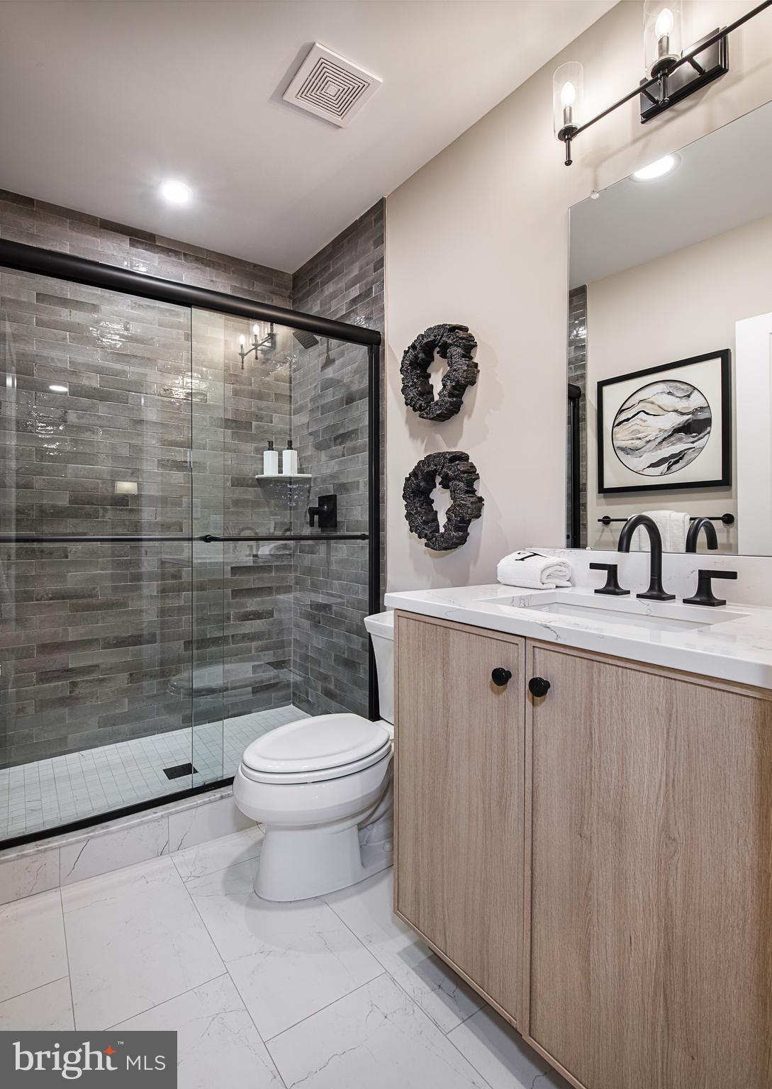 Stony Road, Unit ROLLINS Warminster, PA 18974 - Photo 6 of 15 a bathroom with a toilet a sink and a shower