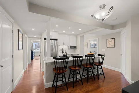 a view of a dining room with furniture