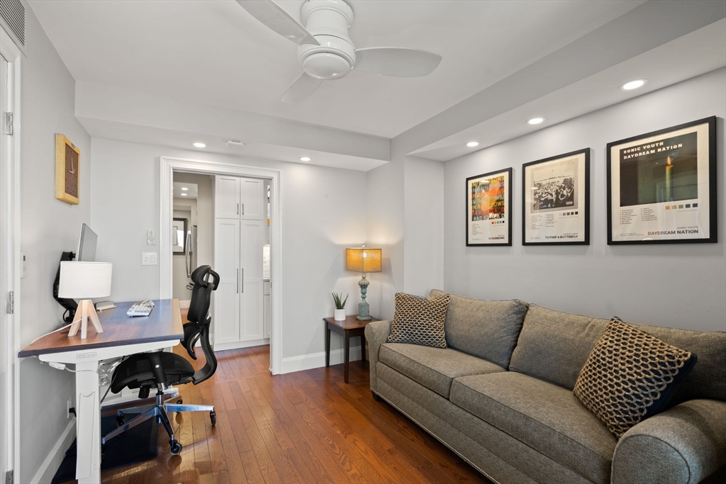 85 East India Row, Unit 20G Boston, MA 02110 - Photo 14 of 37 a living room with furniture