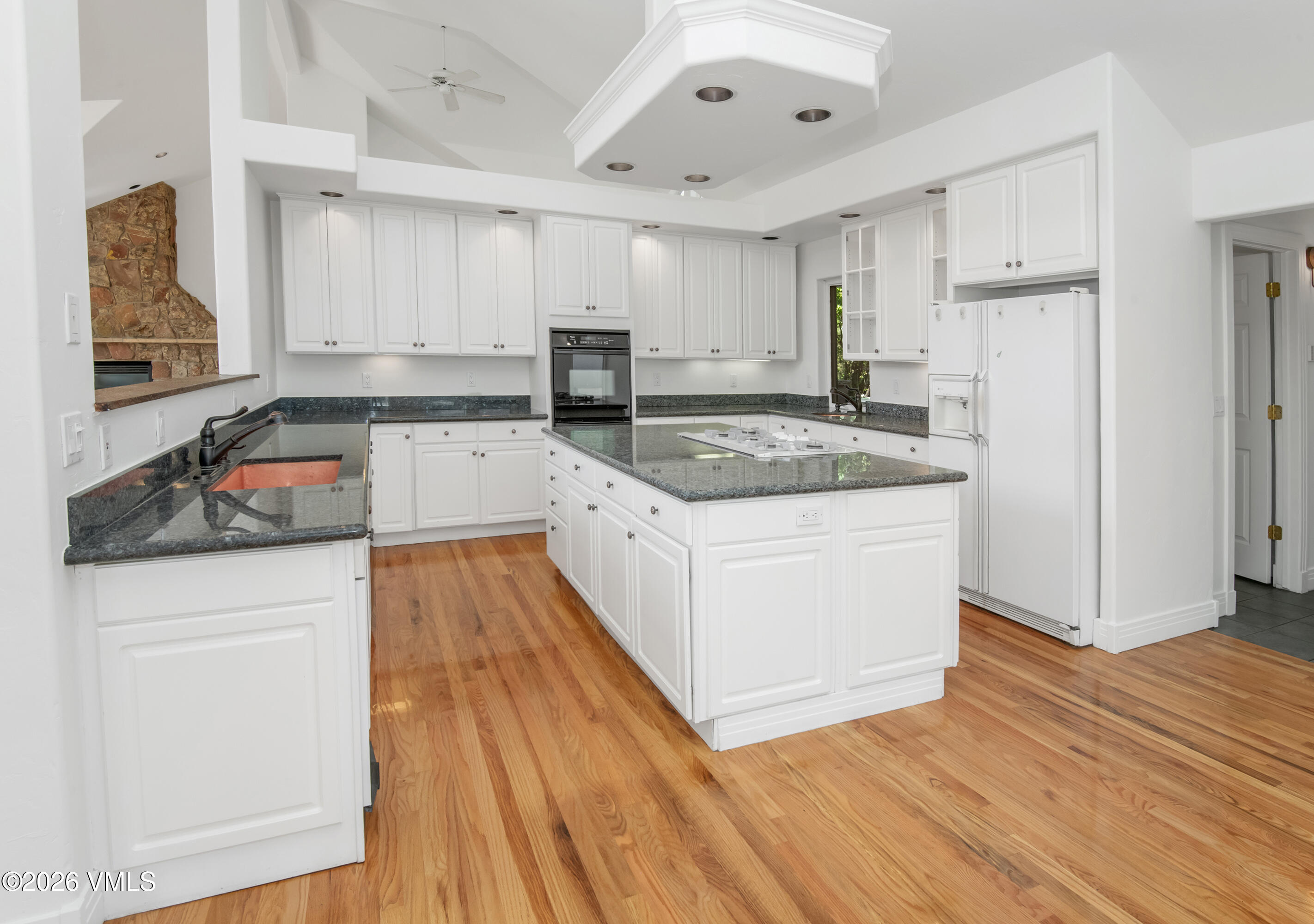 471 Rawhide Road Edwards, CO 81632 - Photo 12 of 51 a kitchen with stainless steel appliances granite countertop a sink stove and refrigerator