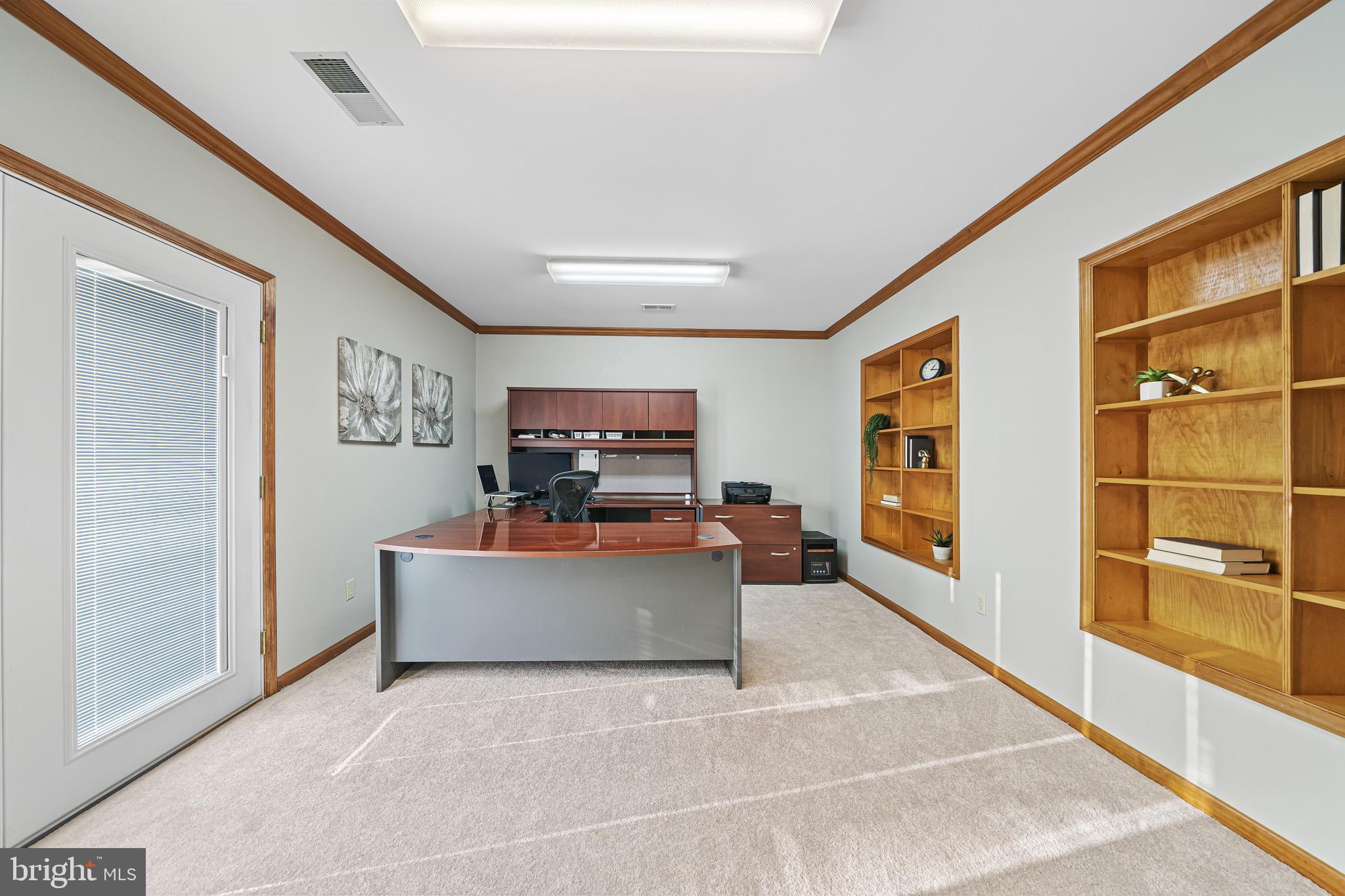 7365 Simms Landing Road Port Tobacco, MD 20677 - Photo 13 of 53 Office w/ built in shelving & doors to yard