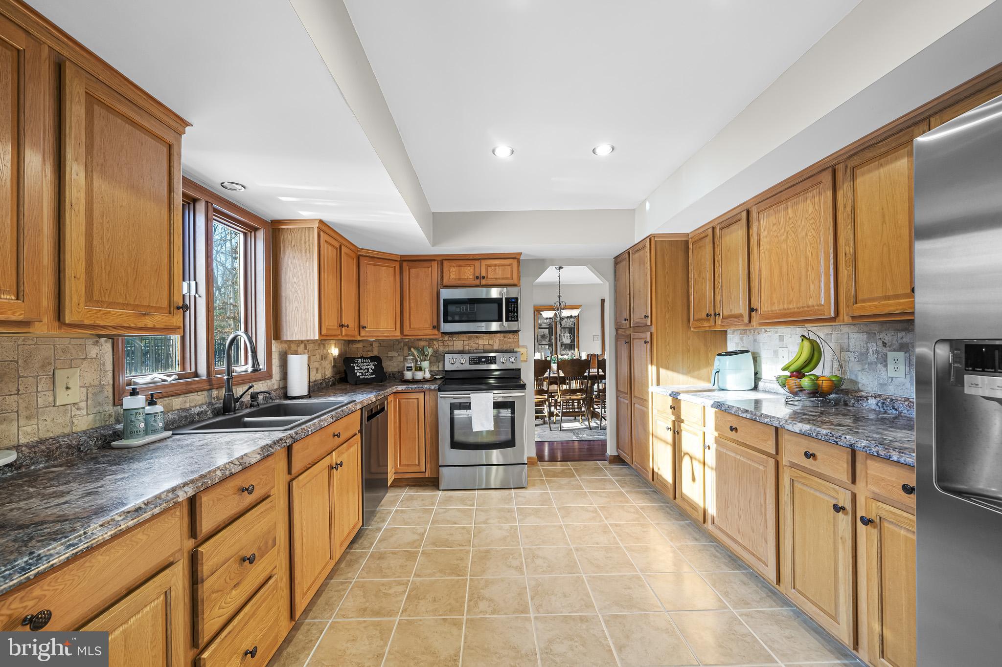 7365 Simms Landing Road Port Tobacco, MD 20677 - Photo 17 of 53 Kitchen off dining w/ stainless steel appliances