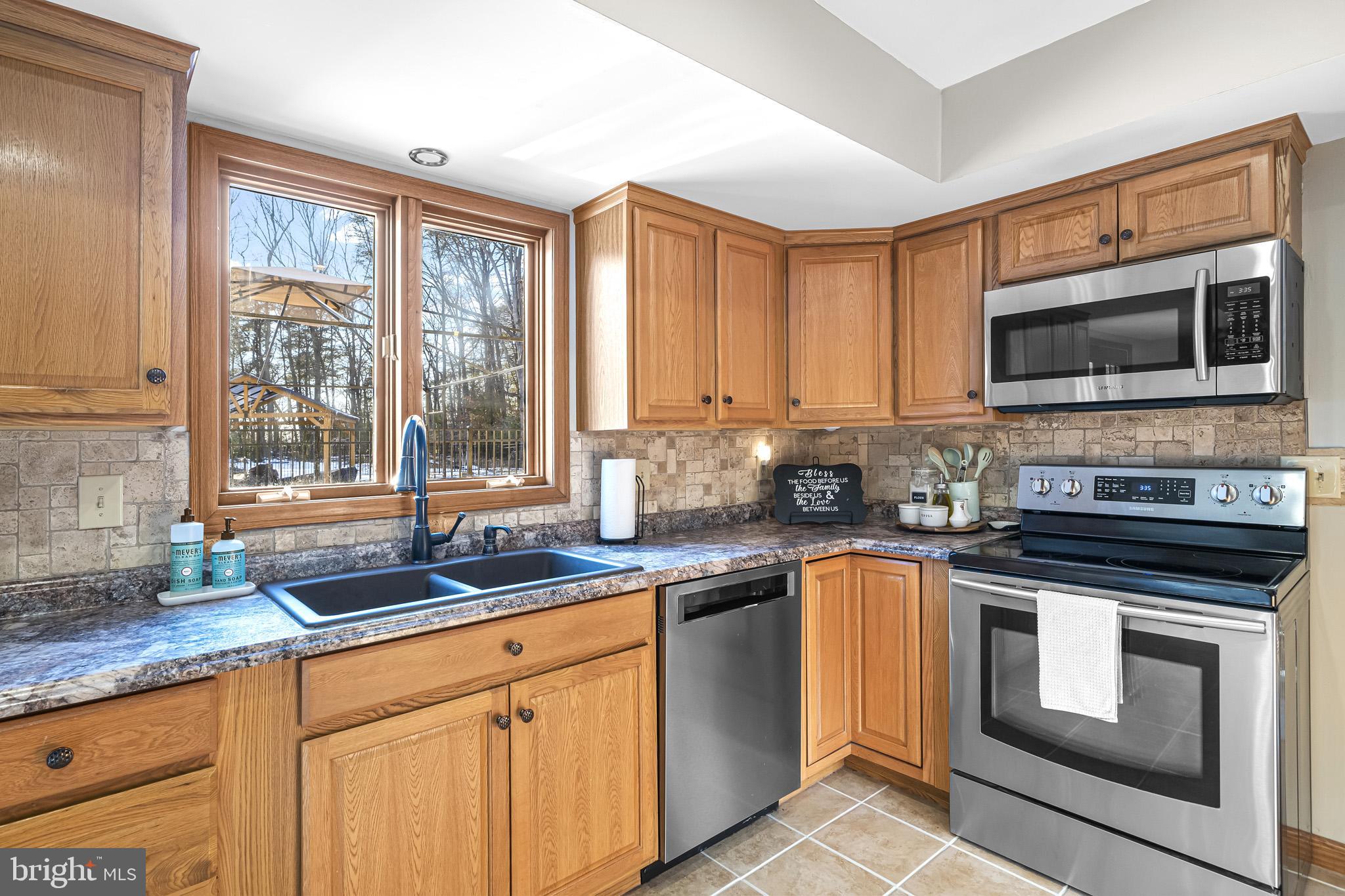 7365 Simms Landing Road Port Tobacco, MD 20677 - Photo 18 of 53 Kitchen w/ views of pool & yard