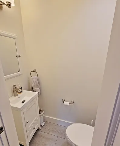 a bathroom with a sink and toilet