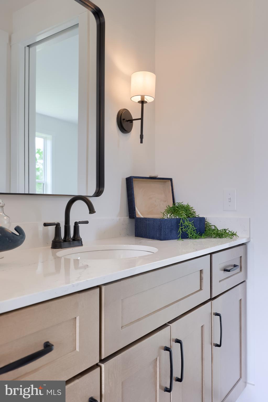 136 Stillcreek Road Millersville, PA 17551 - Photo 12 of 72 a bathroom with a sink and a mirror