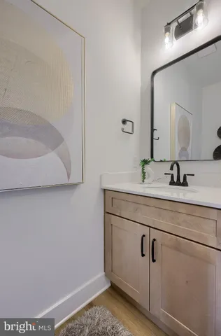 a living room with furniture potted plant and a window