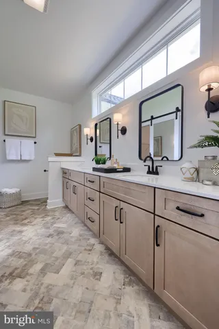 a open kitchen with stainless steel appliances granite countertop a kitchen island a stove a sink a dining table and chairs with wooden floor