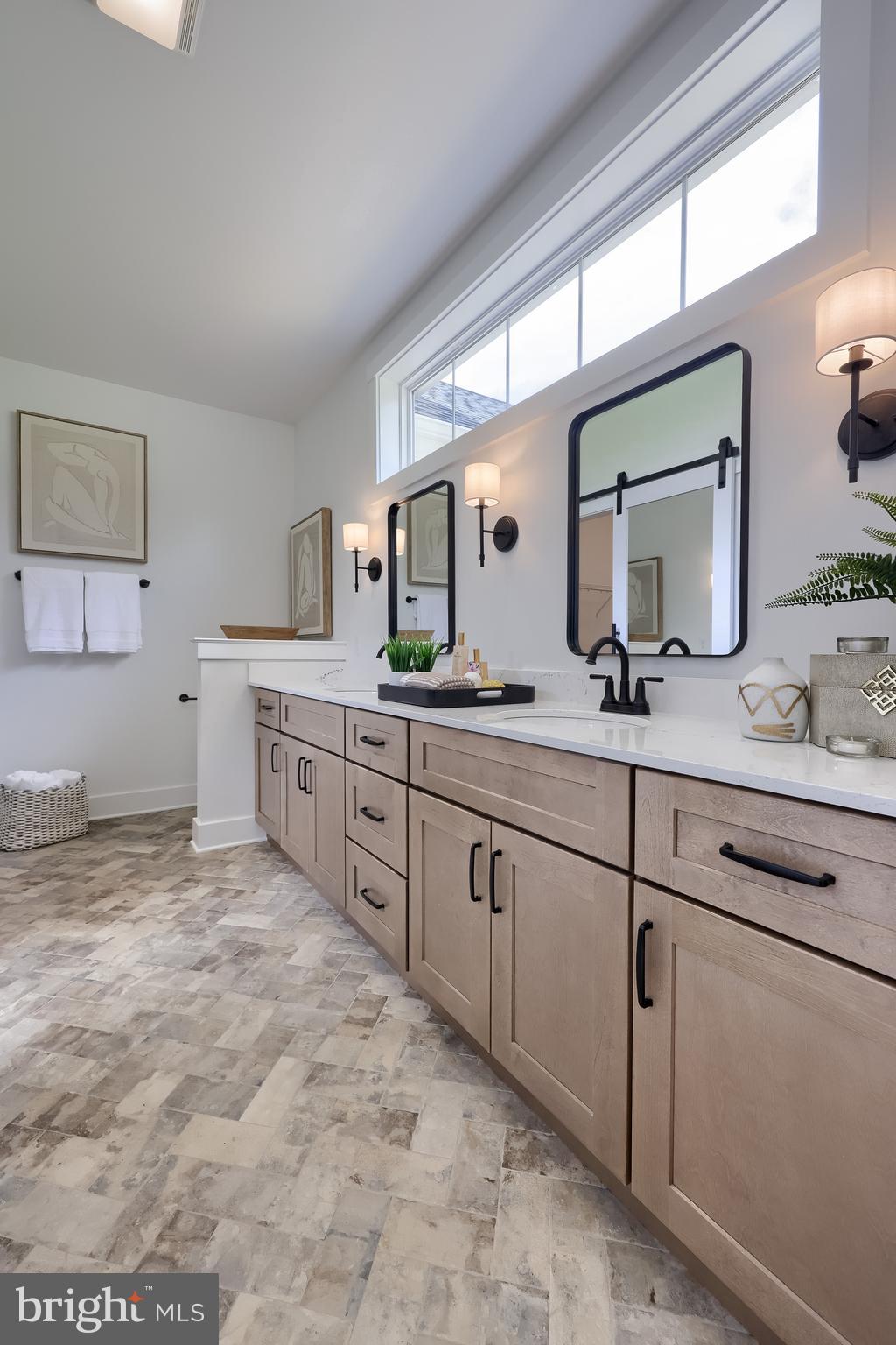 136 Stillcreek Road Millersville, PA 17551 - Photo 27 of 72 a spacious bathroom with a granite countertop sink and a mirror