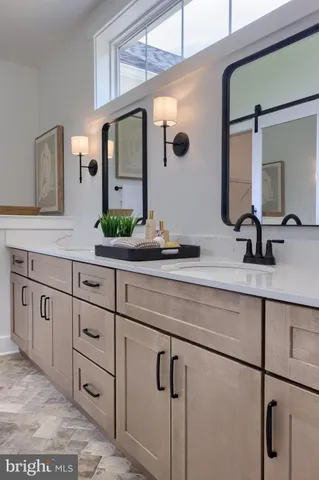 a view of a bedroom with bathroom