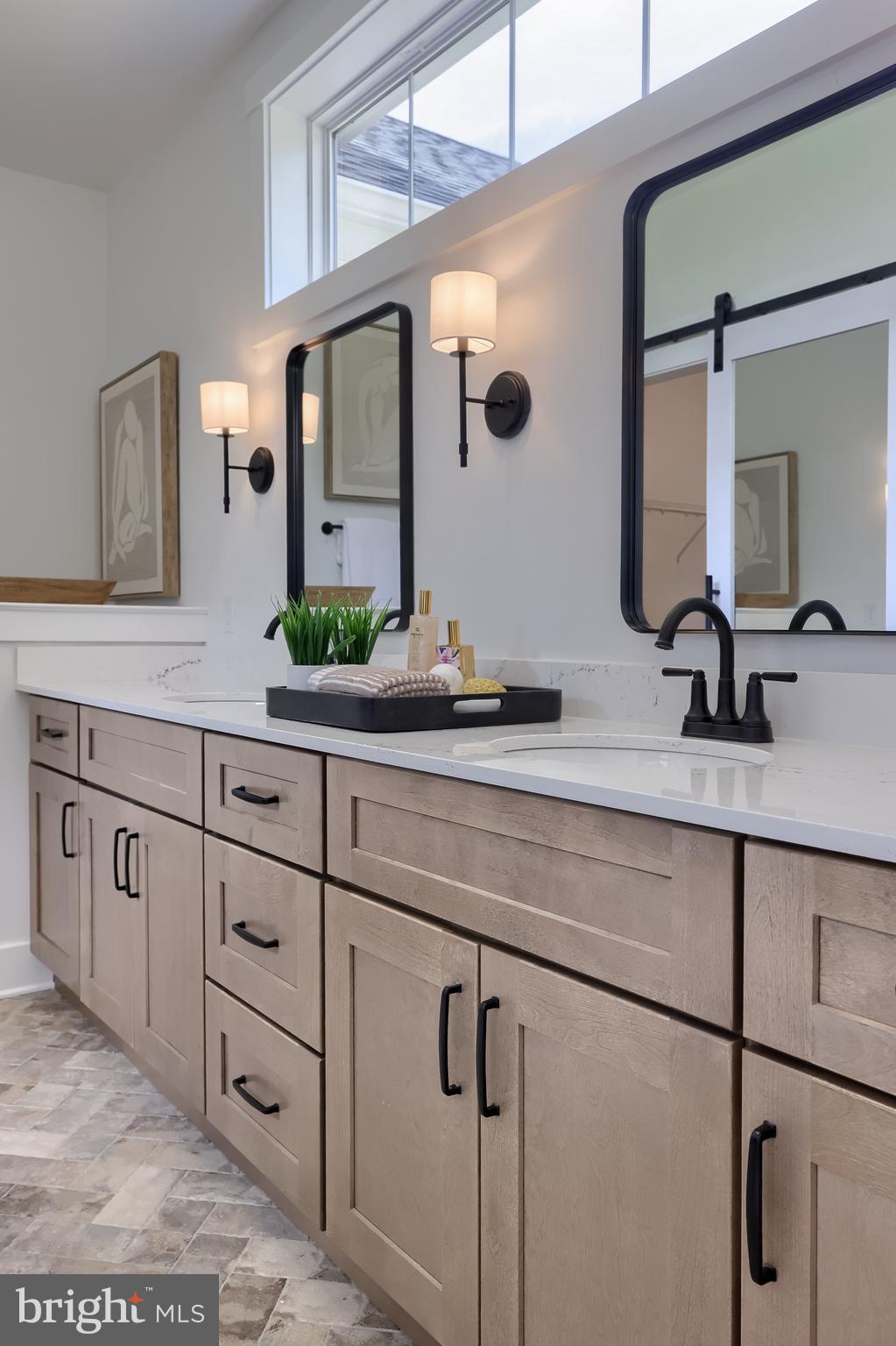 136 Stillcreek Road Millersville, PA 17551 - Photo 28 of 72 a bathroom with a double vanity sink and mirror