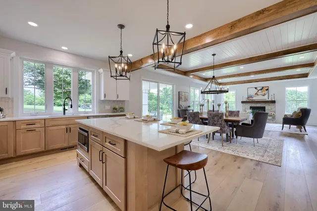 a kitchen with a sink cabinets and appliances