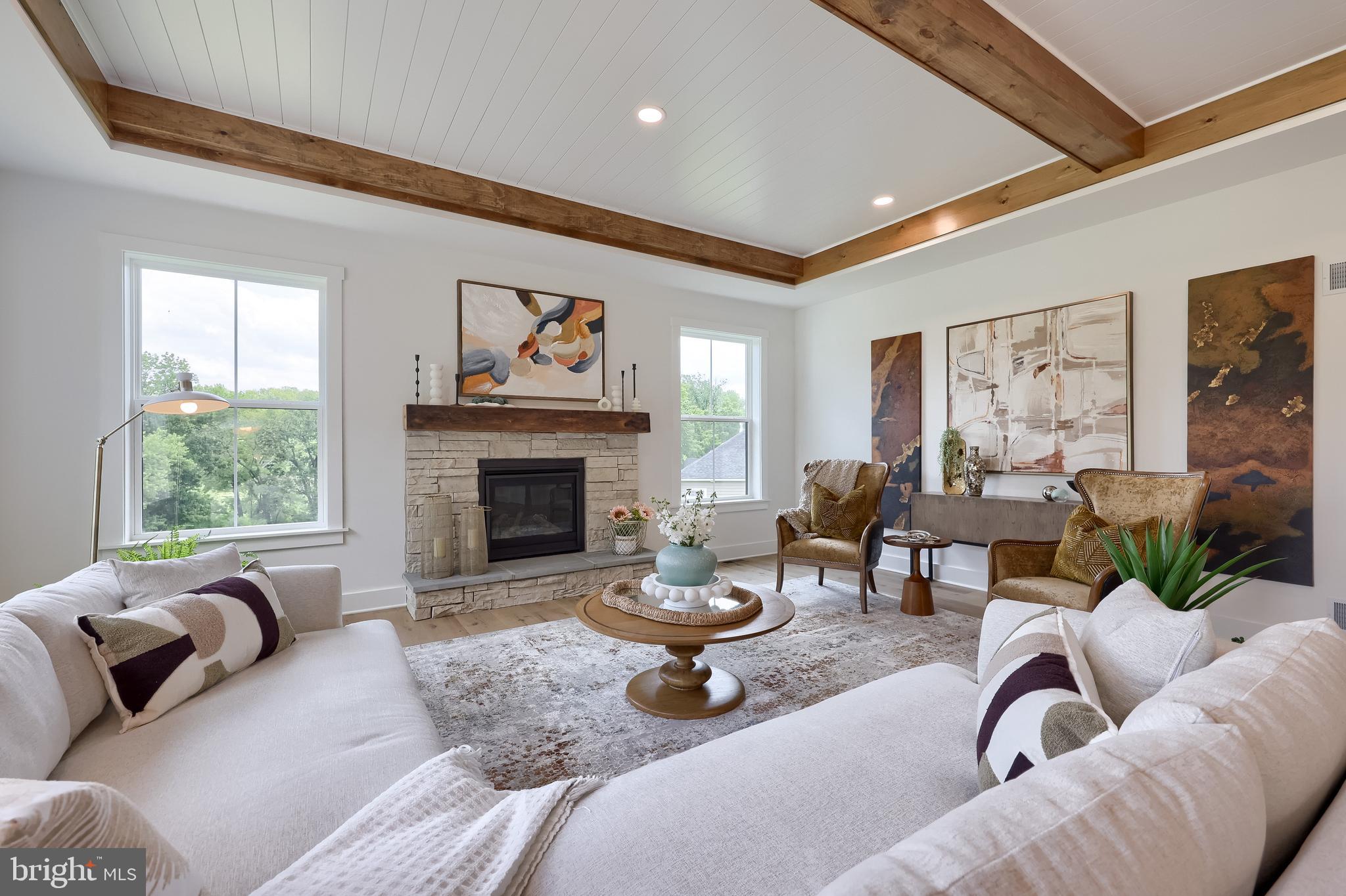 136 Stillcreek Road Millersville, PA 17551 - Photo 45 of 72 a living room with furniture large window and a fireplace
