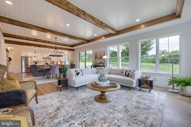 an aerial view of a house with a garden