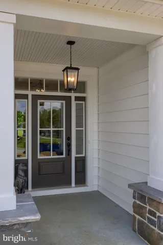 a living room with granite countertop furniture and fireplace