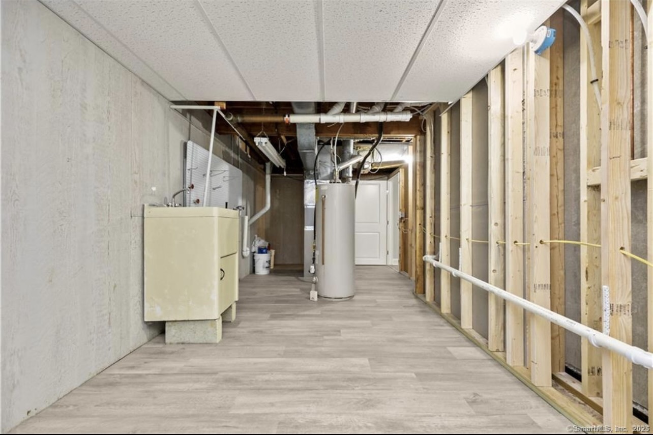 383 Sequoia Lane, Unit A Stratford, CT 06614 - Photo 16 of 17 a view of a storage & utility room