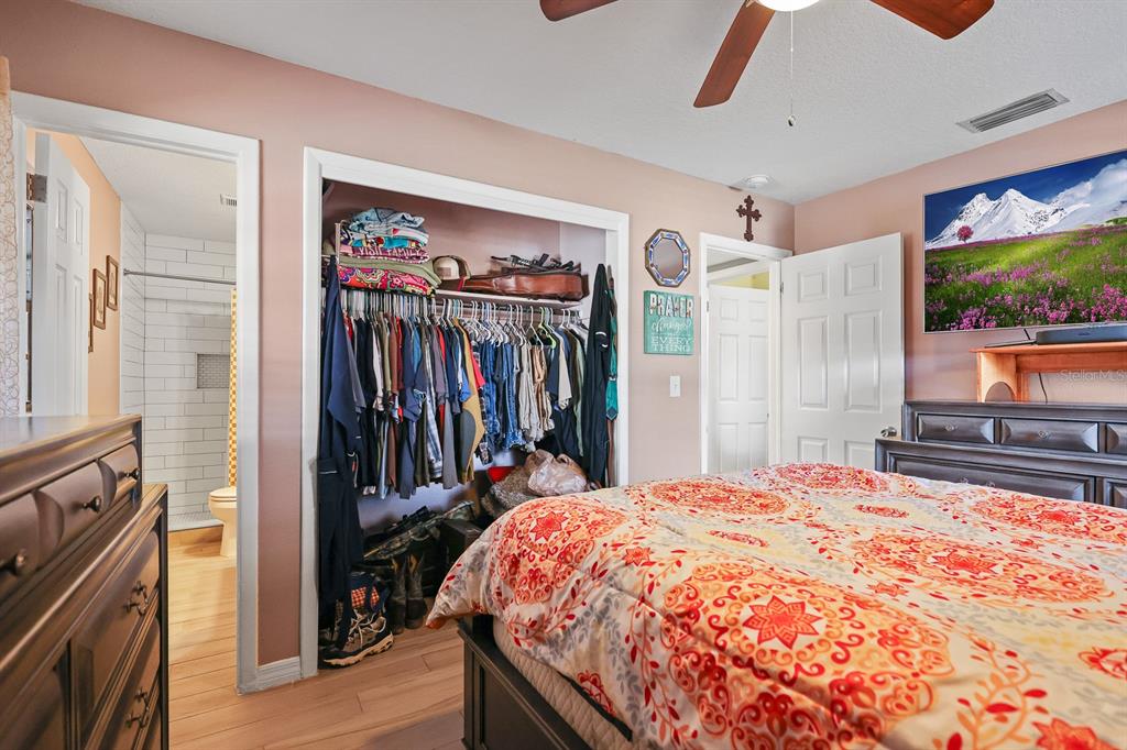 1001 Alpine Drive Brandon, FL 33510 - Photo 13 of 29 a bed sitting in a bedroom next to a window