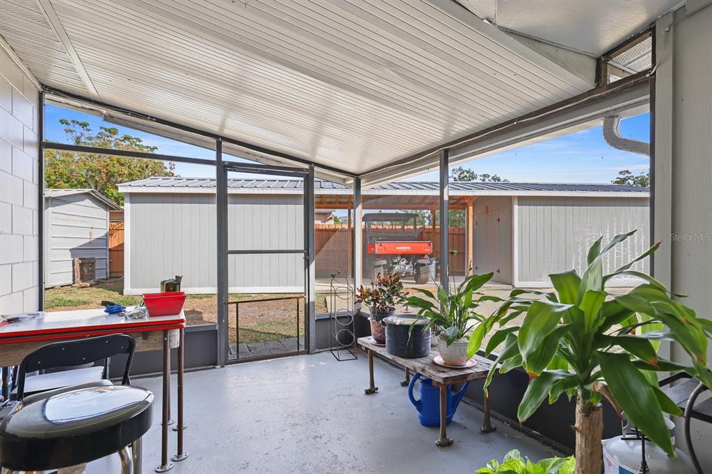 1001 Alpine Drive Brandon, FL 33510 - Photo 22 of 29 a room with furniture and a potted plant