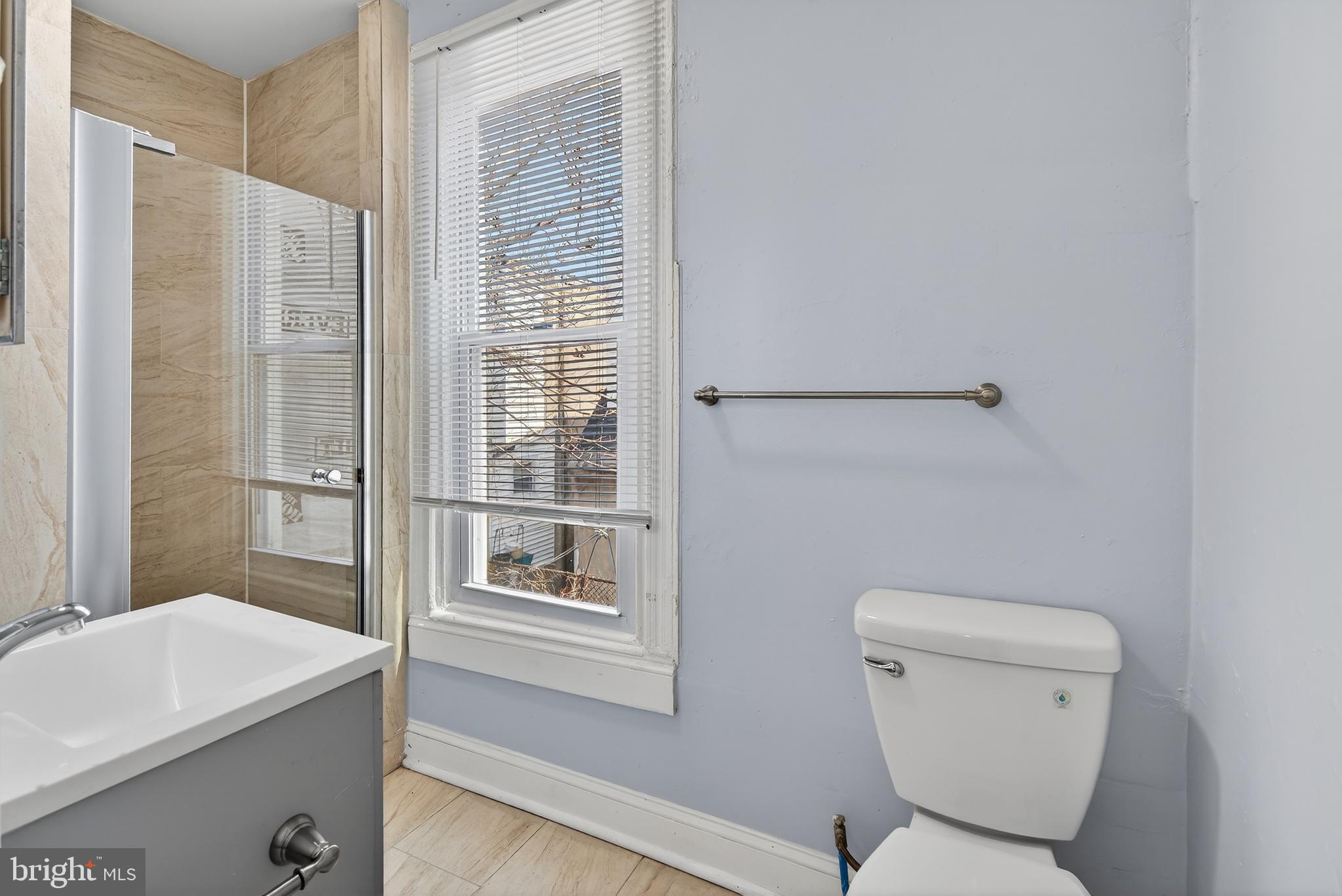 3039 Gransback Street Philadelphia, PA 19134 - Photo 6 of 10 a bathroom with a toilet sink and shower