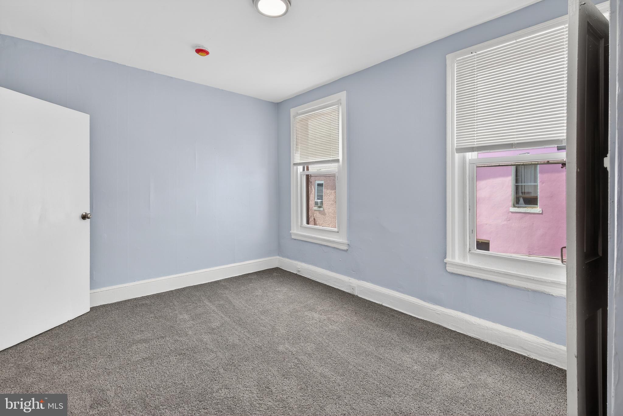 3039 Gransback Street Philadelphia, PA 19134 - Photo 8 of 10 an empty room with windows