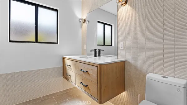a bathroom with a shower and a toilet