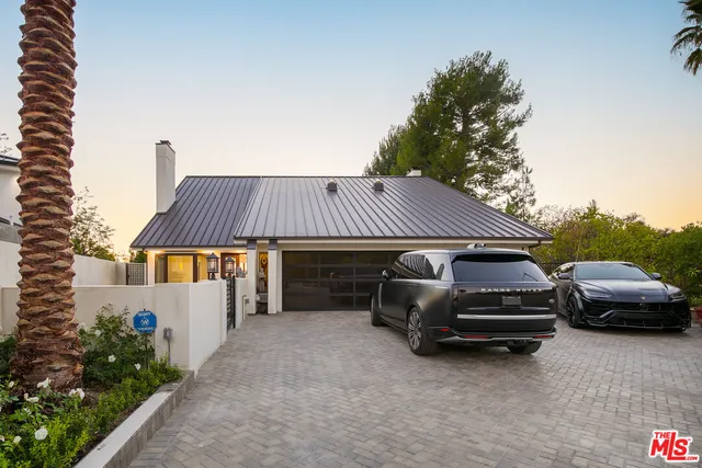a car parked in front of a house