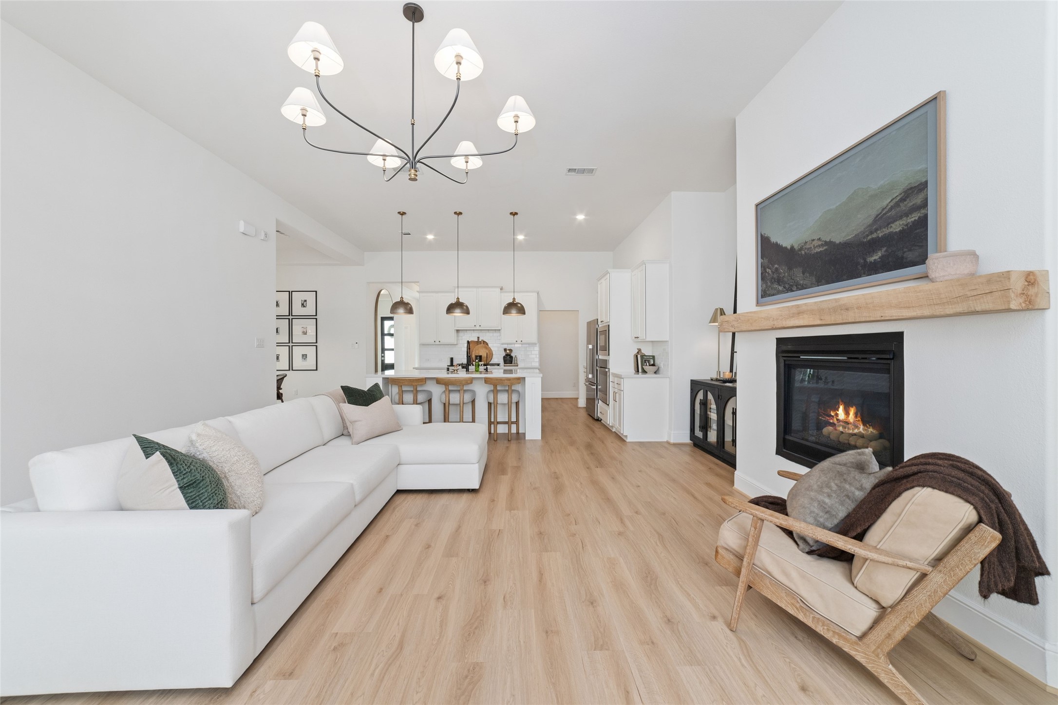 15208 Tree Swallow Court Magnolia, TX 77354 - Photo 11 of 50 a living room with furniture and a fireplace