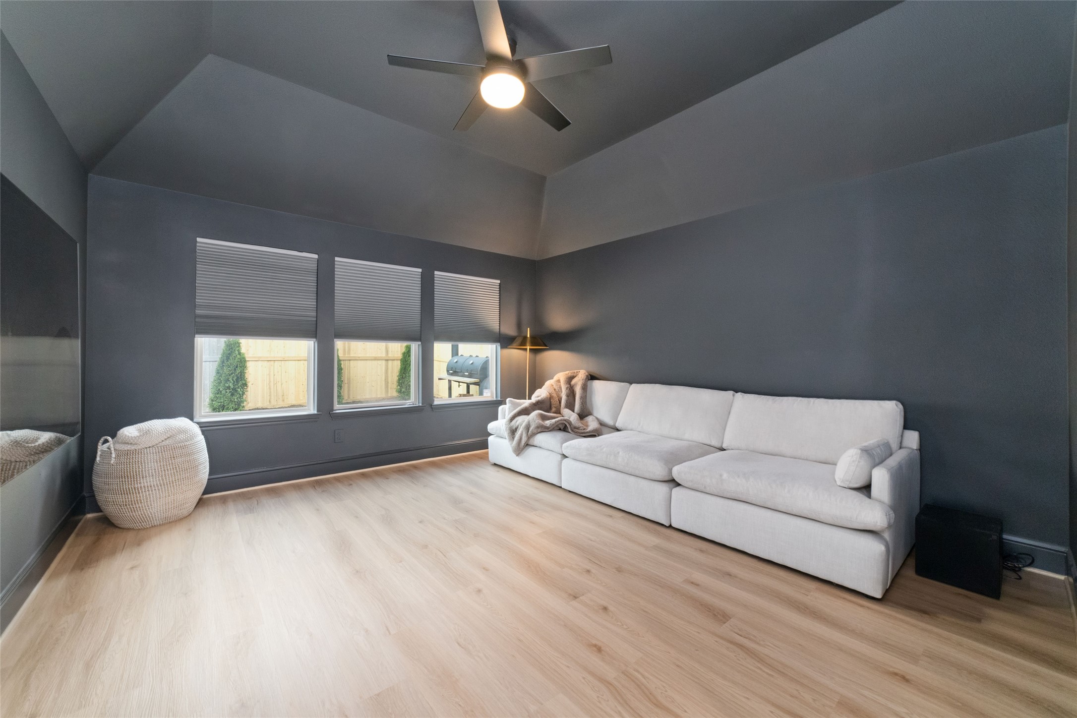 15208 Tree Swallow Court Magnolia, TX 77354 - Photo 23 of 50 a living room with furniture and a large window
